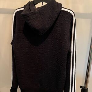 Black Adidas embossed sweatshirt with hood.  Size small.  Like new.